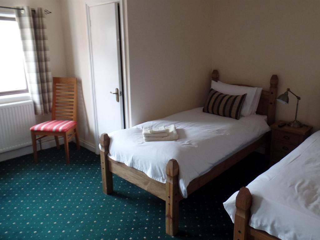Royal George Hotell Great Easton  Rom bilde